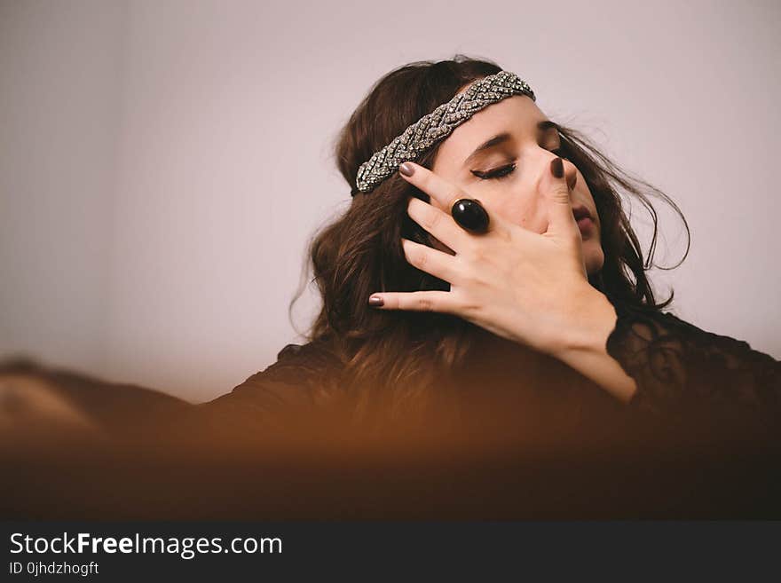 Woman Wearing Gray Woven Headband