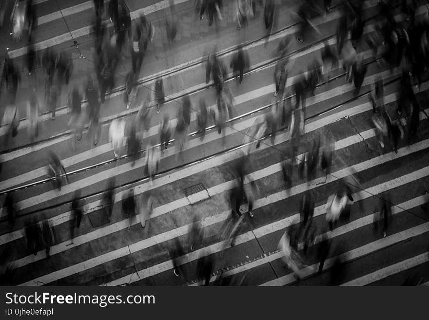 Time Lapse Photography of People Walking on Pedestrian Lane