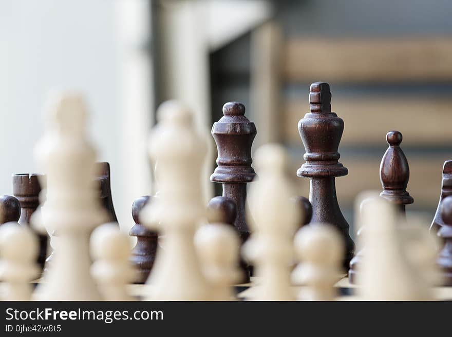 Selective Focus Photo of Chess Set