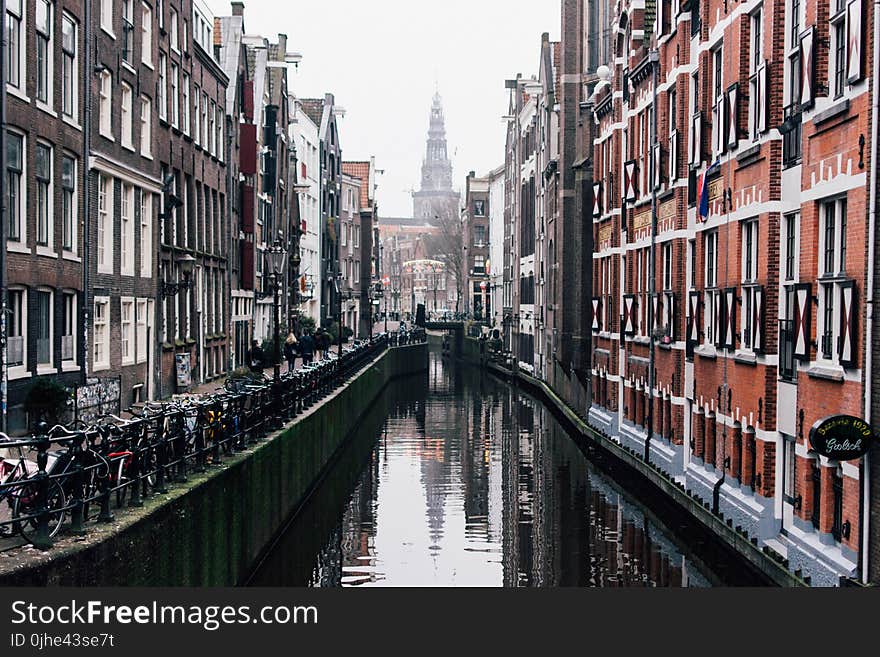 Photography of Buildings Near the Canal