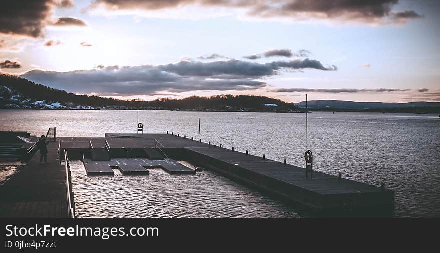 Person on Gray Dock