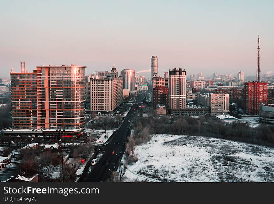 White and Red High-rise Building during Winter Season