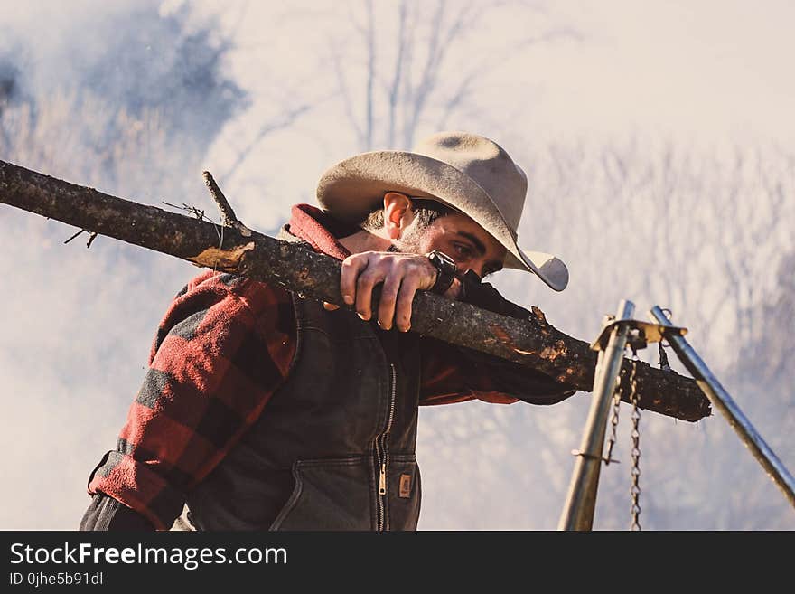 Photo of Man Wearing Cowboy Hat