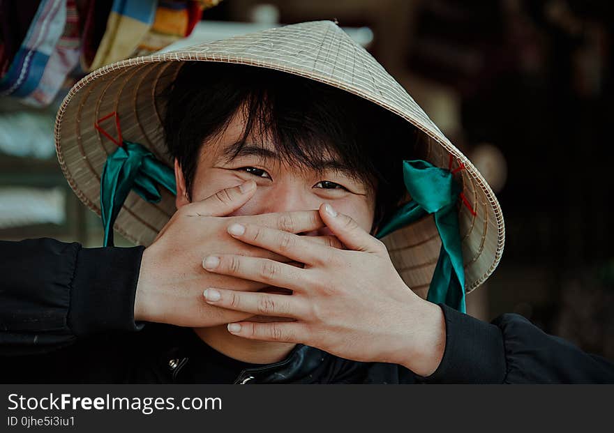 Man Wearing Wicker Hat