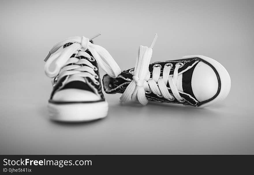 Pair of Laced-up Black Low-top Sneakers