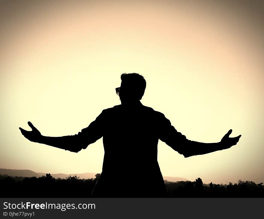 Silhouette of a Man Wearing Eyeglasses