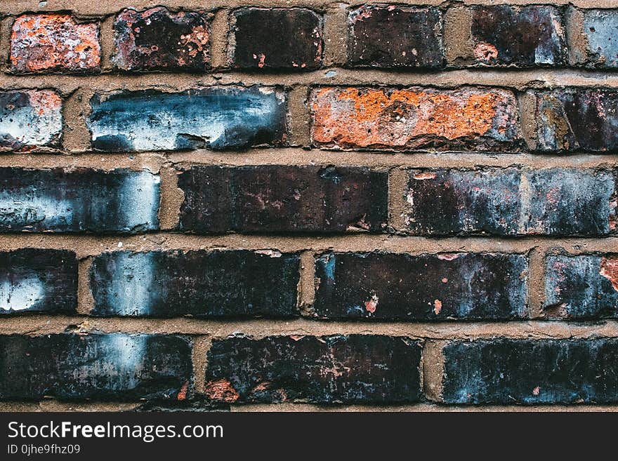 Black, Blue, and Orange Concrete Brick