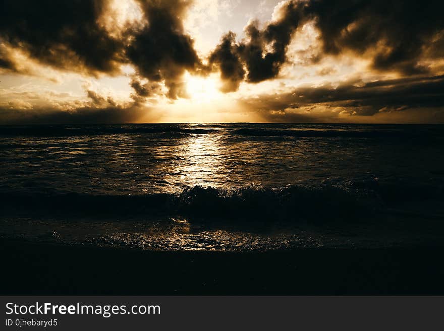 Photo of Sea during Sunset