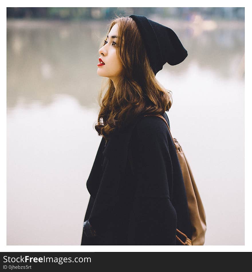 Woman With Black Knit Hat