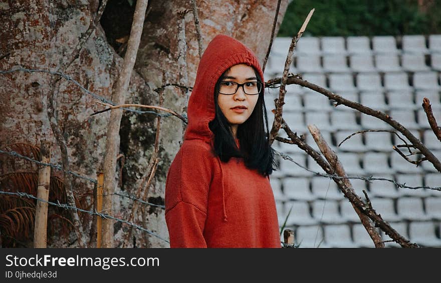 Woman In Red Pullover Hooded Jacket