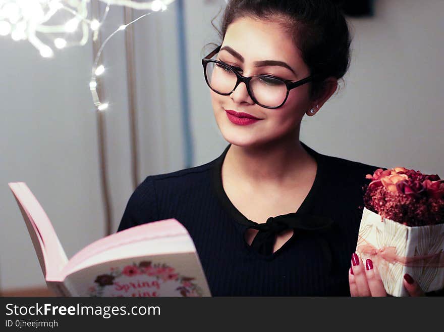 Woman Holding Book