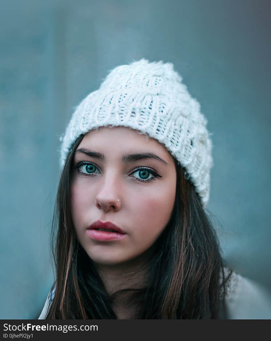 Woman Wearing Knitted White Hat With Nose Ring