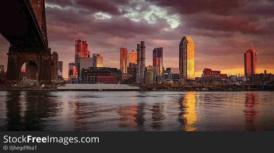 Panoramic Photography of City Near Body of Water