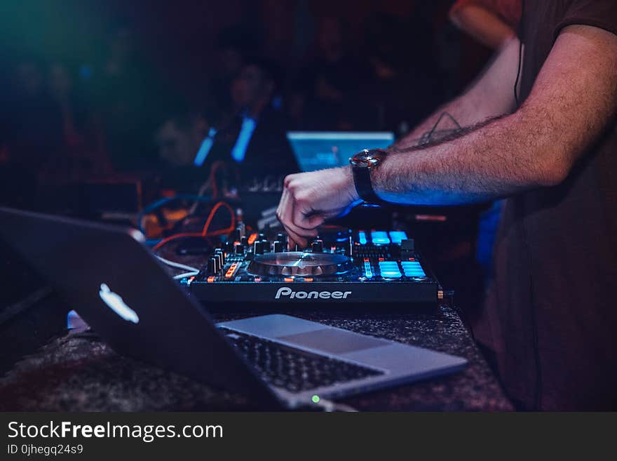 Person Playing Dj Turntable