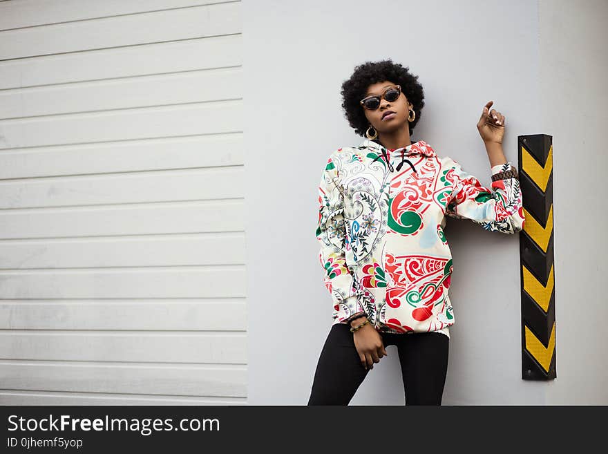 Woman in White and Red Floral Jacket