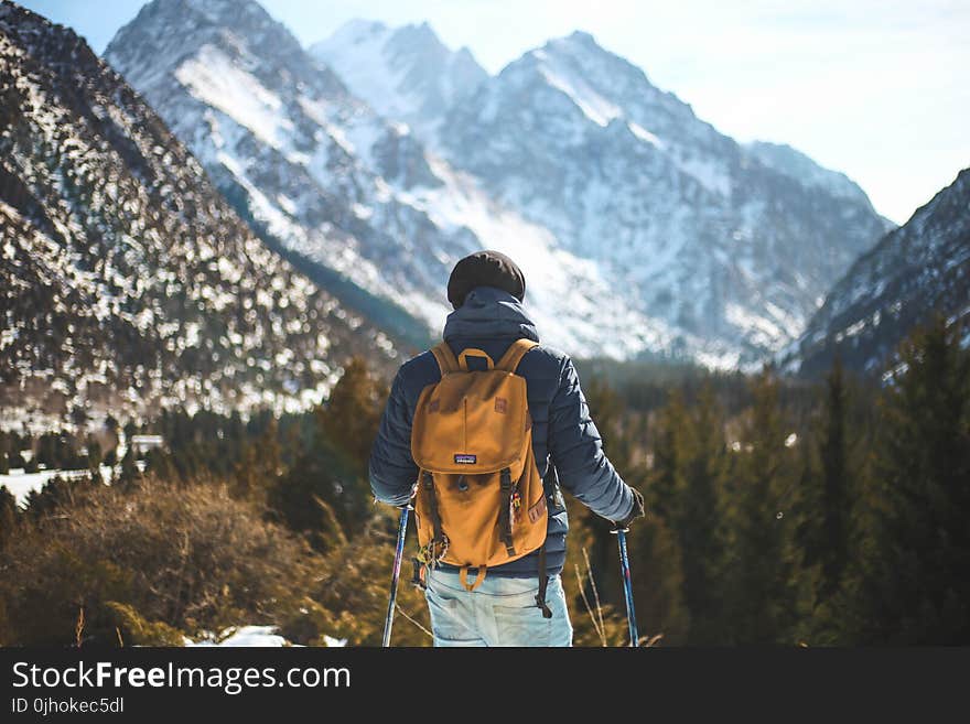 Men&#x27;s Blue Leather Jacket and Brown Backpack