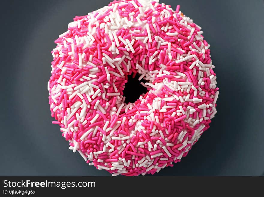 Doughnut With White and Pink Sprinkles