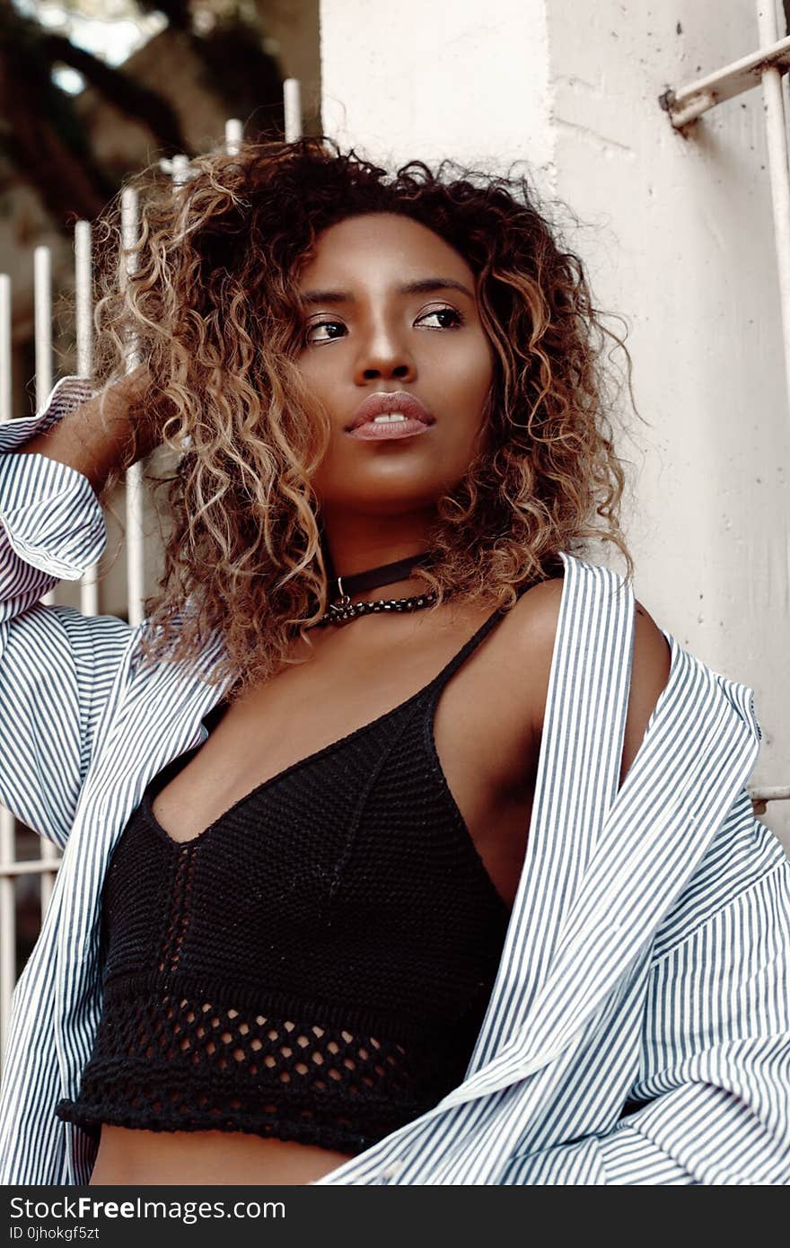 Woman in Black Spaghetti Strap Crop-top Posing for Photo