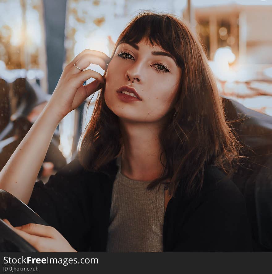 Shallow Focus Photography of Woman in Gray Top