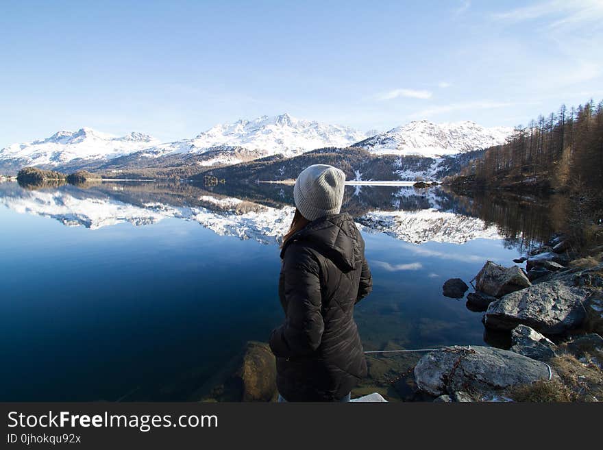 Woman Wearing Black Hooded Jacket Watching Mountain