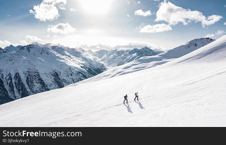 Two Man Hiking on Snow Mountain