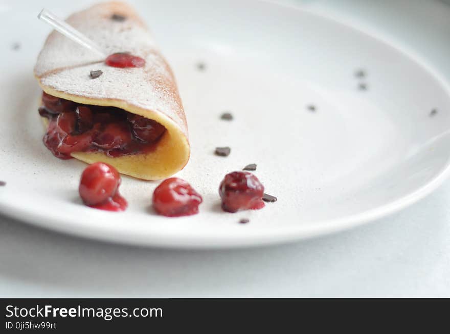 Cherry Crepe Dish on Round White Ceramic Plate