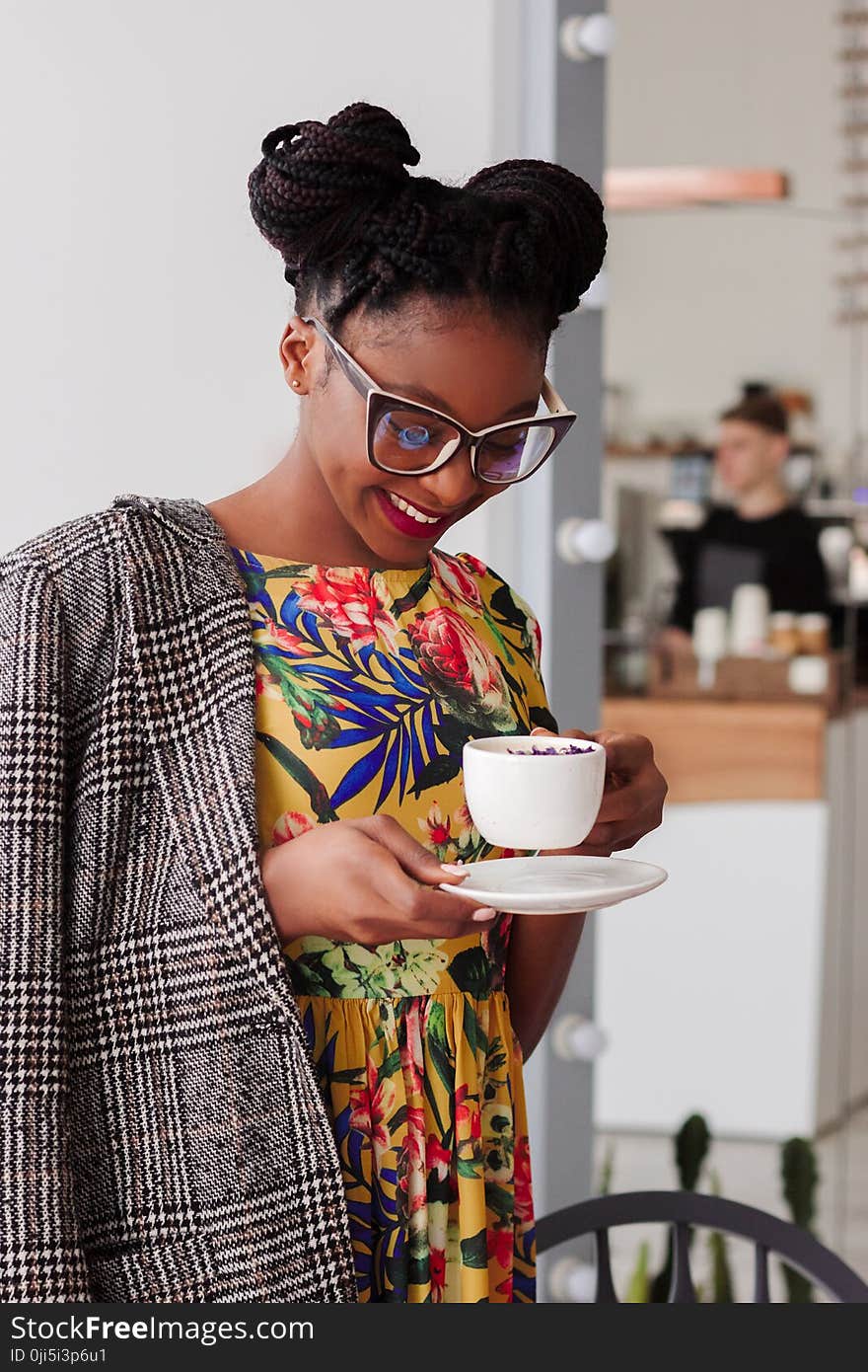 Woman Standing Holding Coffee Mug