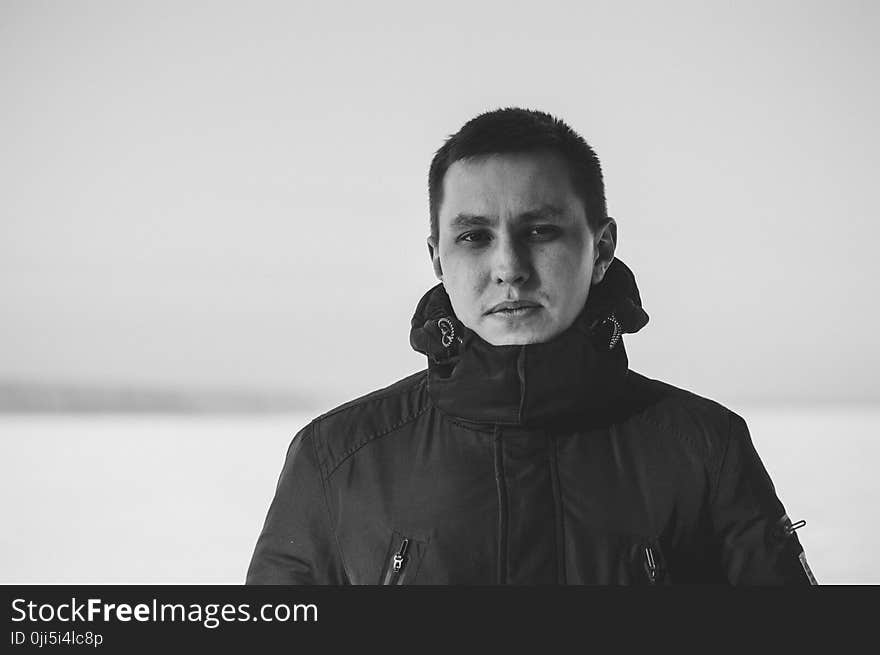 Grayscale Photography of Man Wearing Jacket