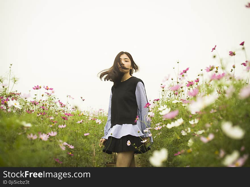 Woman Standing in the Flower Field