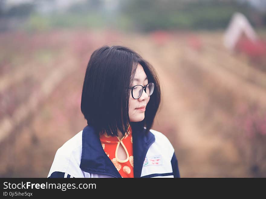 Woman in Black and White Top in Shallow Focus Photography