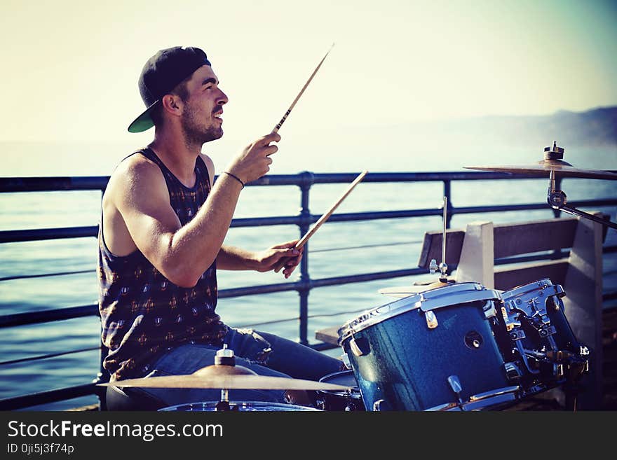 Man Playing Drums