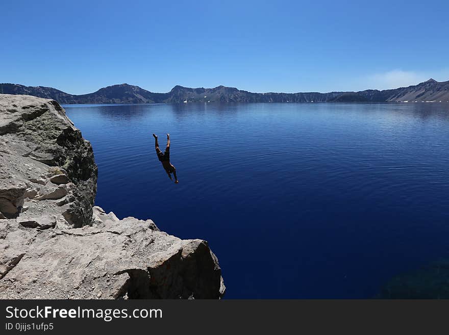 Photo of Man Diving in to Water