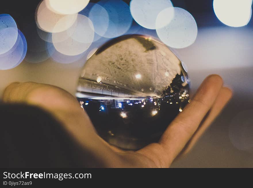 Crystal Ball on Person&#x27;s Hand