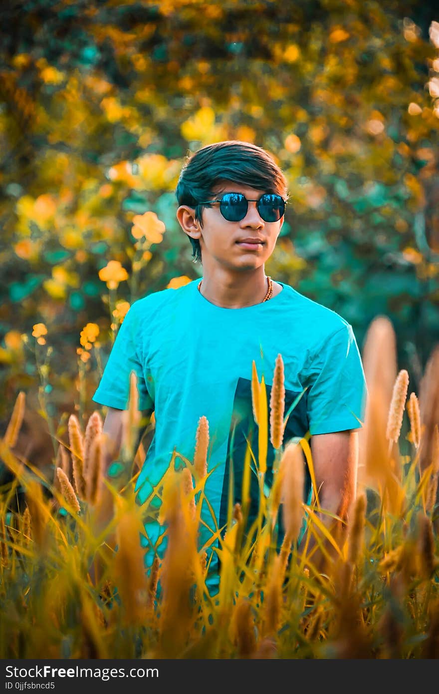 Man Wearing Blue Crew-neck T-shirt