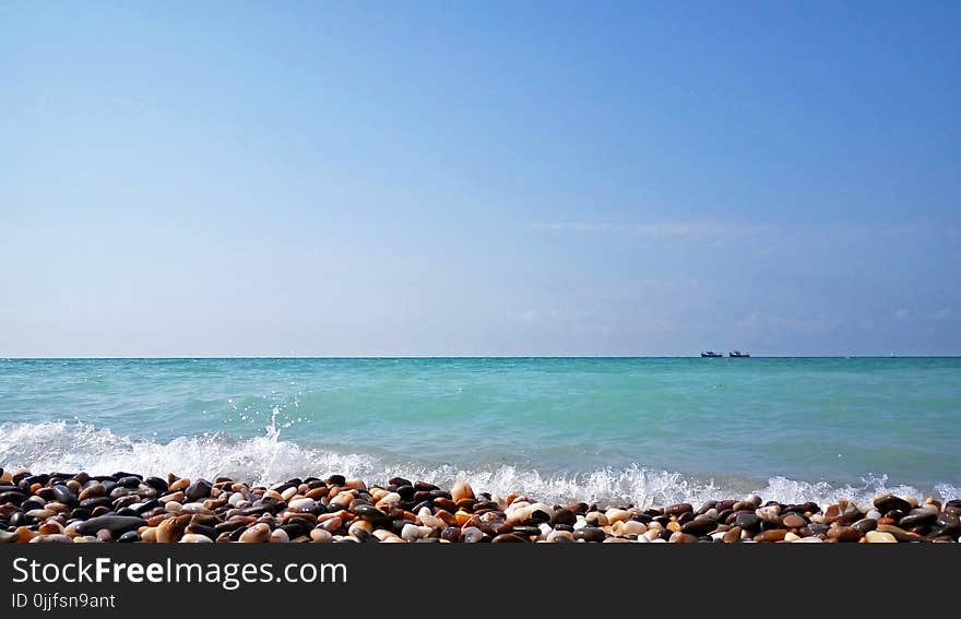 Two Boats on Sea Horizon