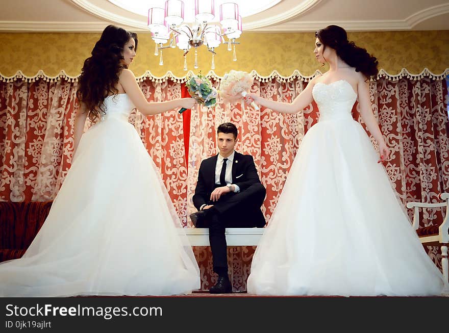 Woman Wearing White Strapless Wedding Dress