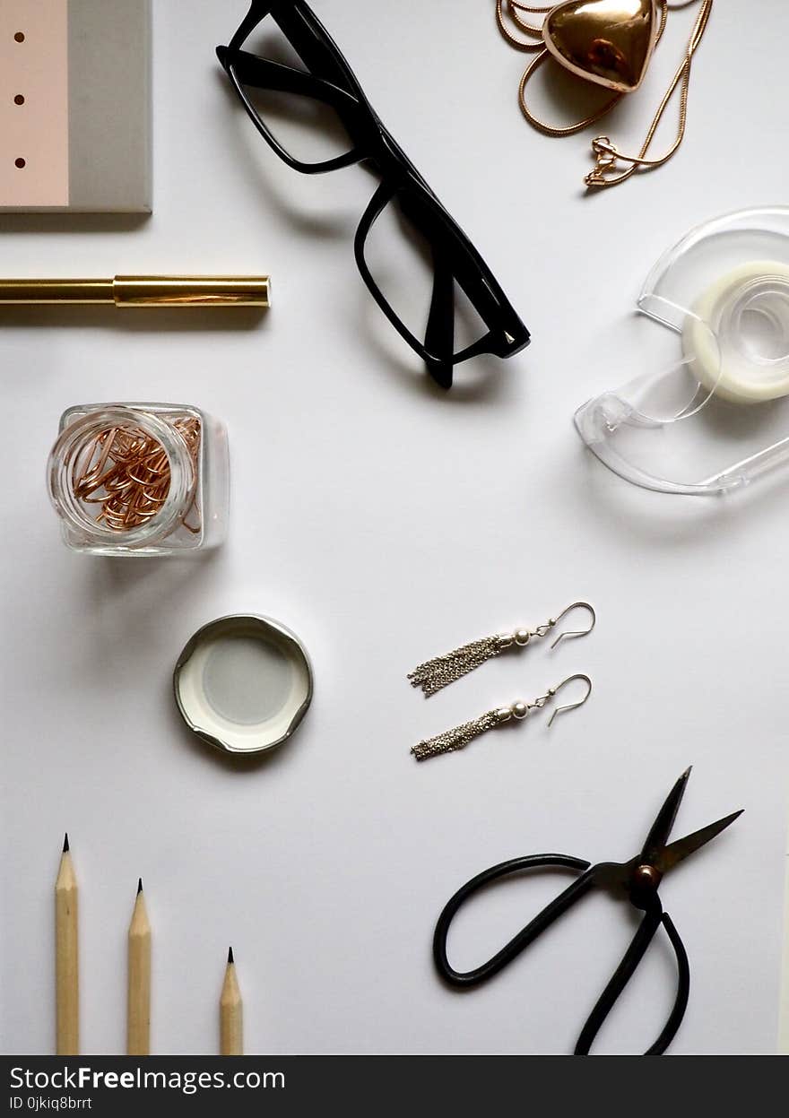 Top-view Photography of White Wooden Table With Personal Accessories on Top