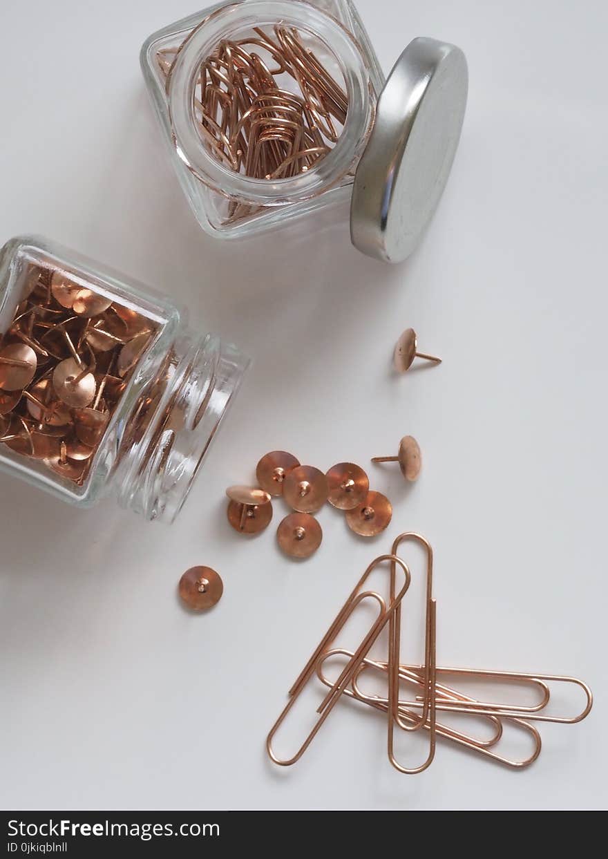 Brown Thumb Tacks and Paper Clips