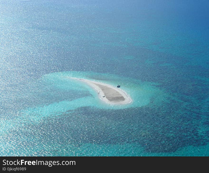 Oval White Sand Island at Daytime