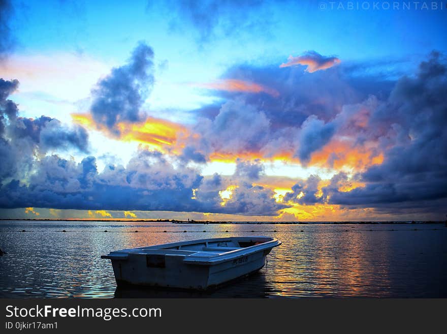 Blue, White, and Orange Skies during Sunset