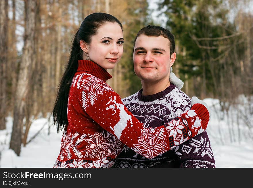 Woman in Red and White Christmas Theme Sweater