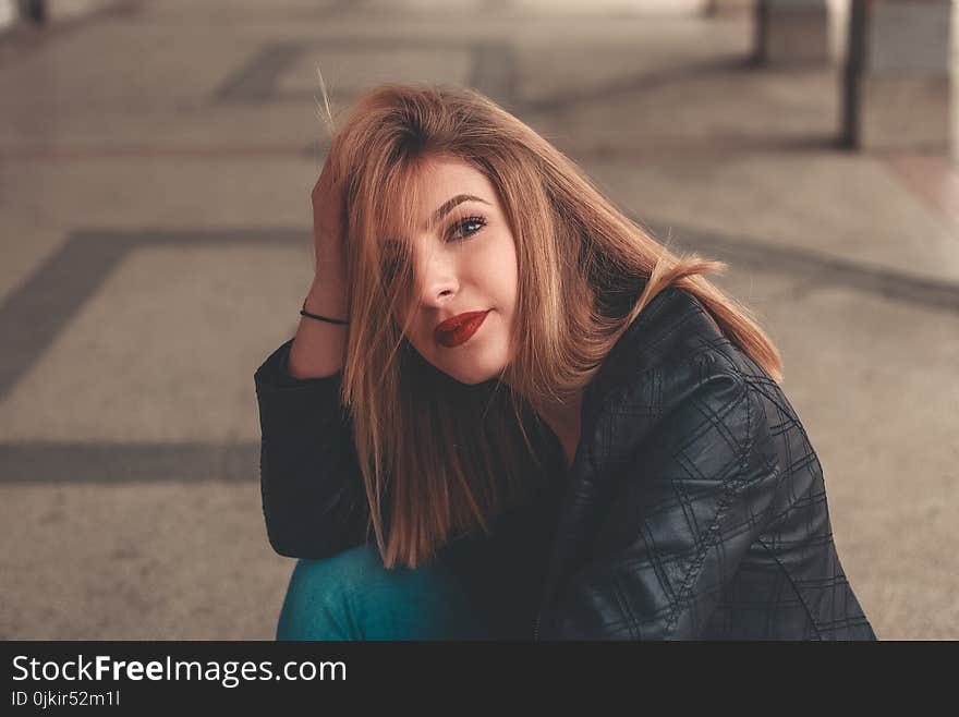 Woman in Black Leather Jacket Smiling