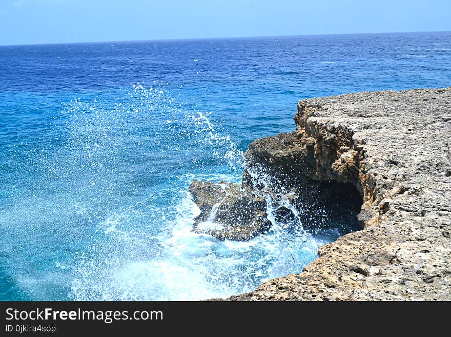 Body of Water and Sea Rock