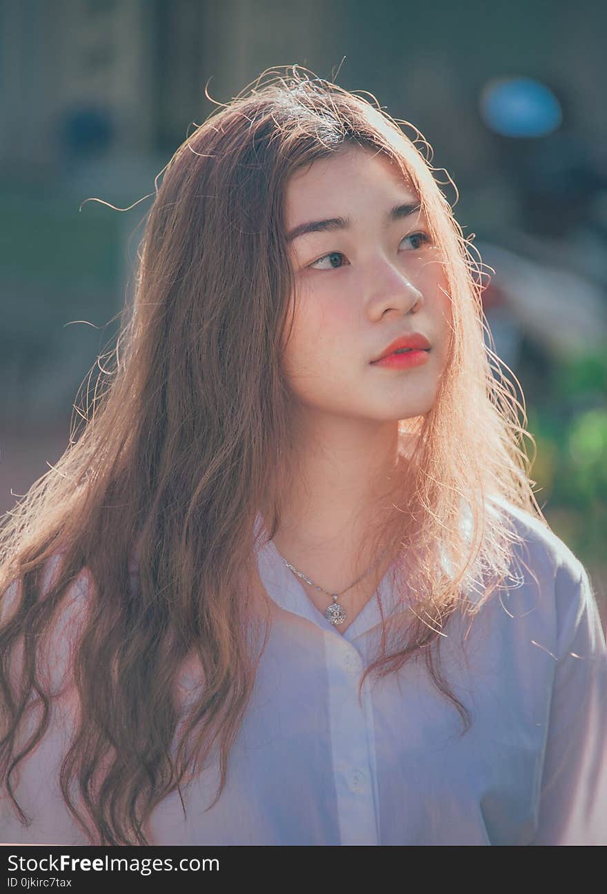 Woman Wearing Purple Button-up Shirt