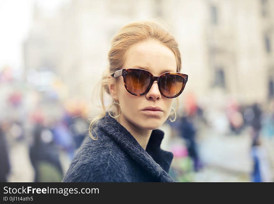 Woman Wearing Black-framed Sunglasses