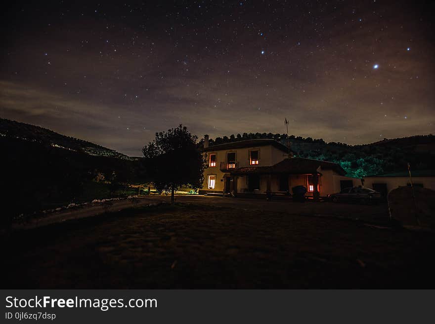 House With Light during Nighttime