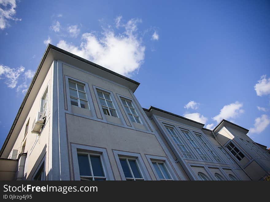 Sky, Building, Daytime, Cloud