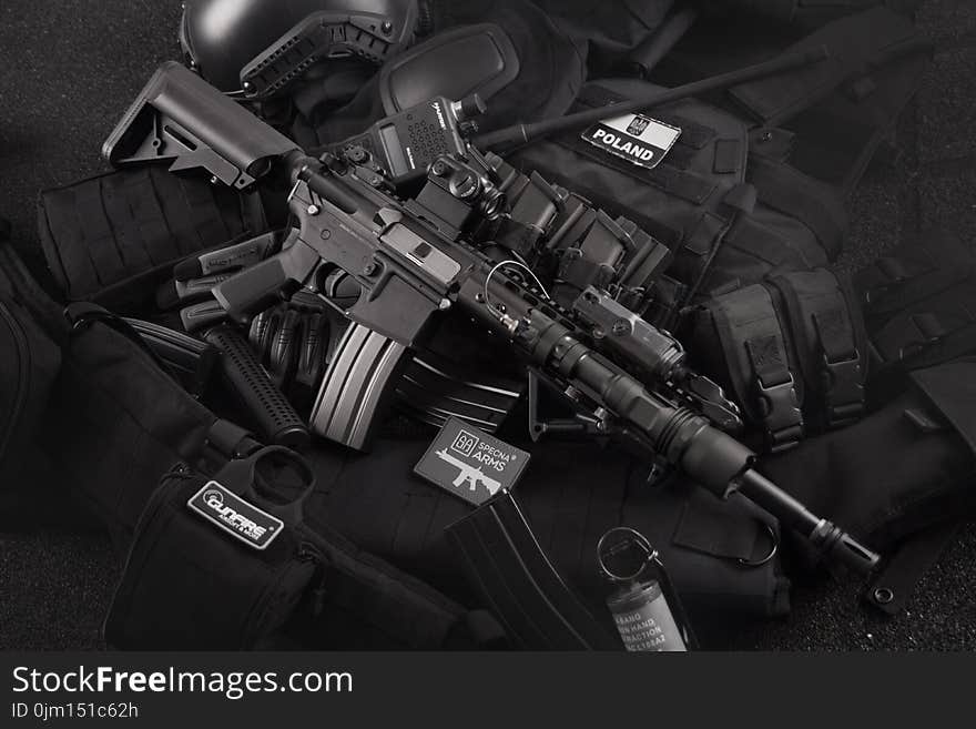 Grayscale Photo of Black M4a1 on Magazines