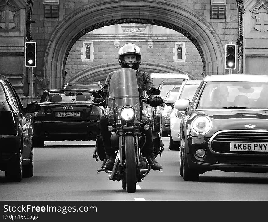 Man Riding Motorcycle Grayscale Photograhy