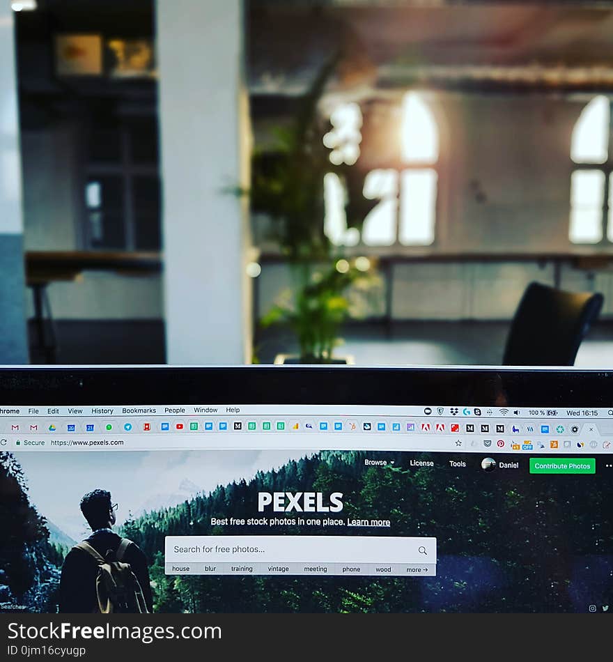 Monitor Displaying Pexels Website